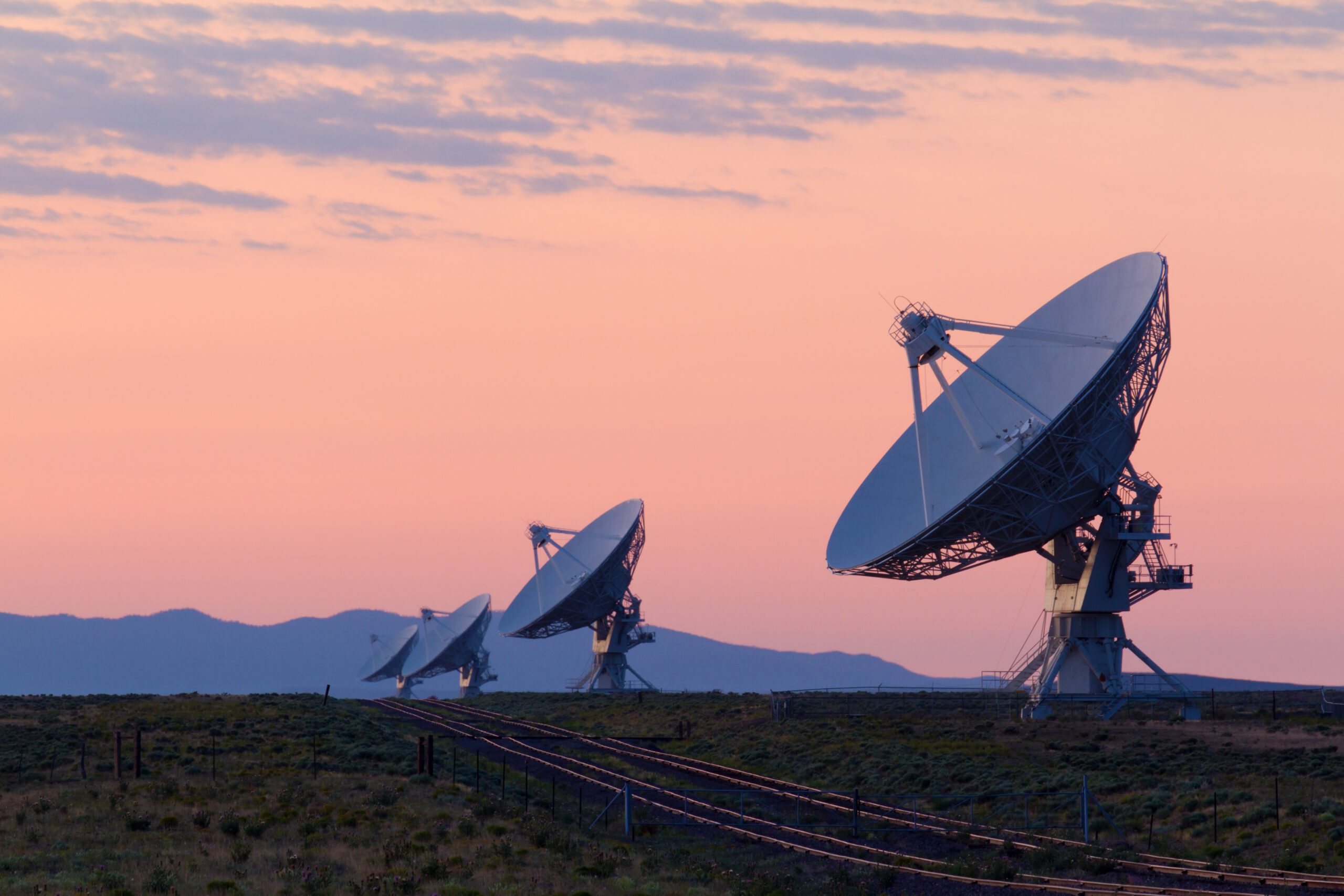 sunset image with telecommunications technology for insider risk management